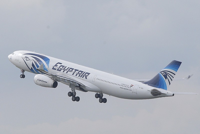 
              FILE - In this May 19, 2016 file photo, an EgyptAir Airbus A330-300 takes off for Cairo from Charles de Gaulle Airport outside of Paris. Egyptians officials say a bomb threat has forced an EgyptAir airliner en route to Beijing from Cairo to make an emergency landing in Uzbekistan, where the aircraft is being searched. (AP Photo/Christophe Ena, File)
            