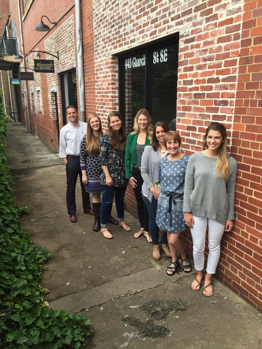 Standing outside the new Cleveland WorkSpace studios in the Old Woolen Mill in Cleveland are, front to back, Delaney Miller, administrative assistant at Chattanooga WorkSpace, Kathy Lennon, director of Chattanooga WorkSpace, Katie Pagnani, special projects and development with Public Markets Inc., Key Waller, founding member of Cleveland WorkSpace, Jaime Barks, founding member and artist at Cleveland WorkSpace, Joy Key, founding member of Cleveland WorkSpace, and Corey Divel, founding member of Cleveland WorkSpace.