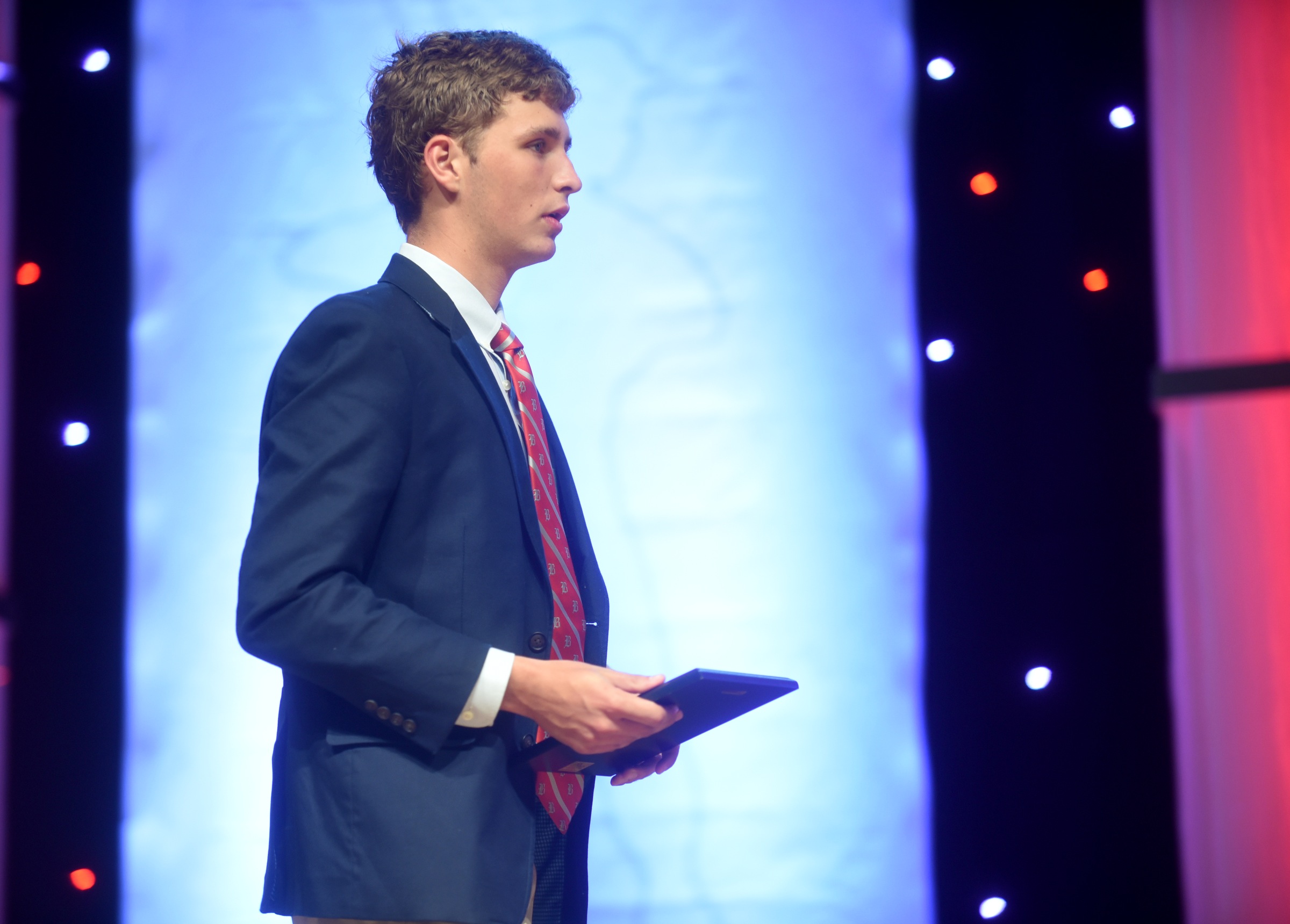 Baylor's Patrick Toomey walks across the stage after accepting the Guerry award for outstanding achievement in boy's tennis at the Best of Preps banquet Thursday, June 9, 2016 at the Chattanooga Convention Center.