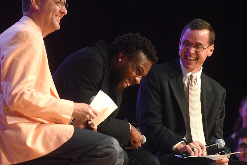 Eric Berry laughs as he answers a question as Stephen Hargis, left, and David Paschall listen at the Best of Preps banquet Thursday, June 9, 2016 at the Chattanooga Convention Center.