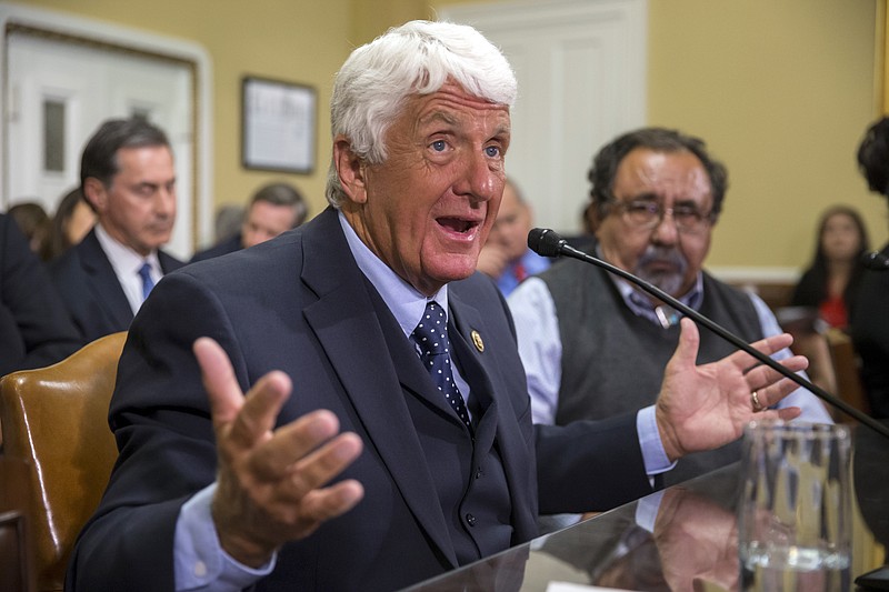 House Natural Resources Committee Chairman Rob Bishop, R-Utah, left, joined at right by Rep. Raul M. Grijalva, D-Ariz., go before the House Rules Committee to prepare a bill that would create a financial control board for Puerto Rico and restructure some of the U.S. territory's $70 billion debt, at the Capitol in Washington, Wednesday, June 8, 2016. With a $2 billion debt payment looming, House leaders and President Barack Obama are pressuring lawmakers in both parties to support legislation to help ease Puerto Rico's financial crisis. (AP Photo/J. Scott Applewhite)