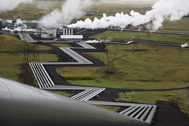 
              FILE - In this July 28, 2011 file photo, giant ducts carry superheated steam from within a volcanic field to the turbines at Reykjavik Energy's Hellisheidi geothermal power plant in Iceland. Scientists have a found a quick but not cheap way to turn heat-trapping carbon dioxide into harmless rock. Experts say the results of a two-year $10 million experiment called CarbFix about one-third of a mile (540 meters) deep in the rocks of Iceland offers new hope for an effective weapon in part of the fight against man-made global warming.  (AP Photo/Brennan Linsley, Fie)
            