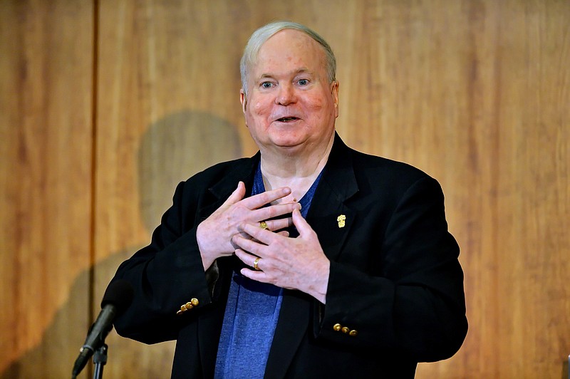 
              FILE - In this May 16, 2014, file photo, author Pat Conroy speaks to a crowd during a ceremony at the Hollings Library in Columbia, S.C. Barbra Streisand and John Grisham are among the honorary board members for a facility dedicated to the late Conroy. His publisher, Doubleday, told The Associated Press on Thursday, June 9, 2016, that the center will host readings, lectures and book groups; offer writing courses and scholarships; and help facilitate other educational programs. (AP Photo/ Richard Shiro, File)
            