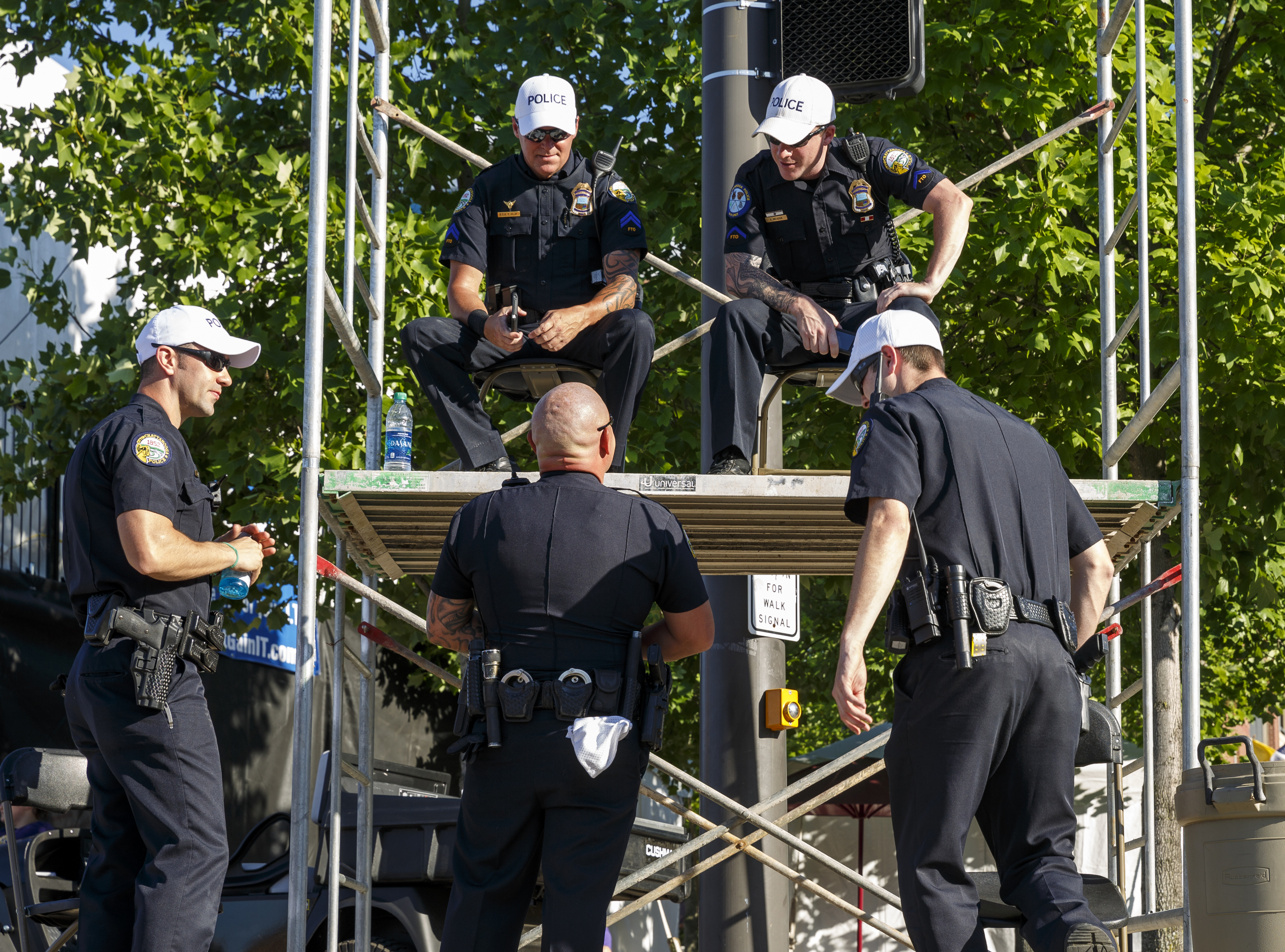 Chattanooga police watch the crowd from a platform on the 1st day of the Riverbend Festival at Ross's Landing on Friday, June 10, 2016, in Chattanooga, Tenn. The festival is celebrating its 35th year, and Thomas Rhett was Friday night's headlining act.