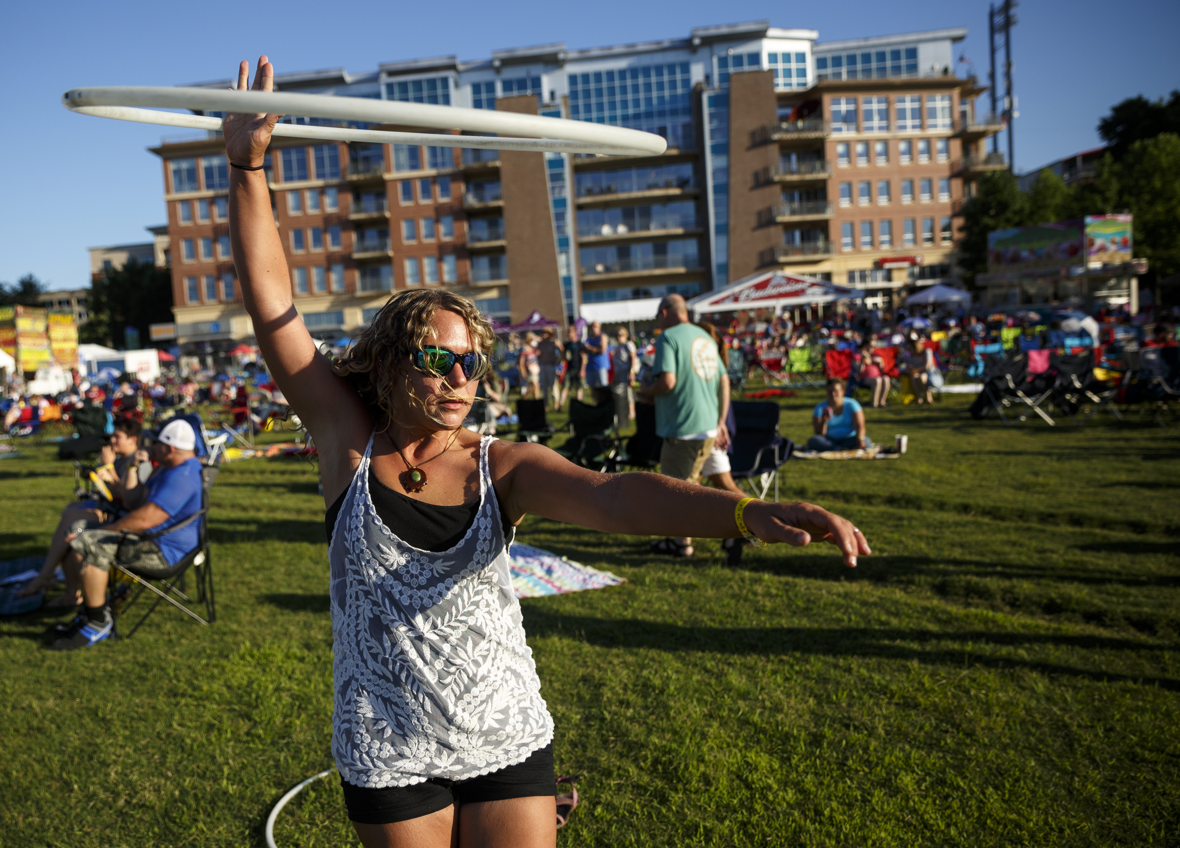 Erica Wells hula hoops on the 1st day of the Riverbend Festival at Ross's Landing on Friday, June 10, 2016, in Chattanooga, Tenn. The festival is celebrating its 35th year, and Thomas Rhett was Friday night's headlining act.