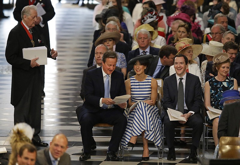 
              Britain's Prime Minister David Cameron, second left, his wife Samantha and Chancellor George Osborne take their seats for a National Service of Thanksgiving to mark the 90th birthday of Britain's Queen Elizabeth II at St Paul's Cathedral in London, Friday, June 10, 2016. Queen Elizabeth II is celebrating her official 90th birthday with a three-day series of festivities starting Friday, on what is also her husband Prince Philip's 95th birthday. The queen's real birthday is in April. (AP Photo/Matt Dunham, Pool)
            