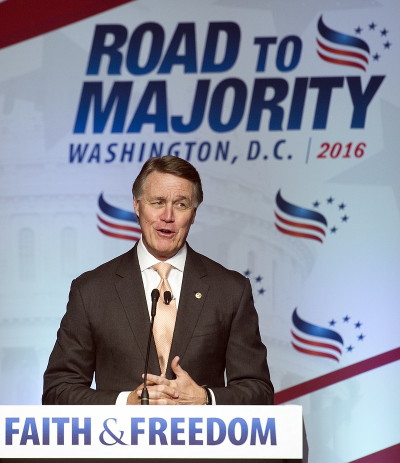 Sen. David Perdue, R-Ga. addresses the Road to Majority Conference in Washington, Friday, June 10, 2016. Perdue told conservatives they should pray for President Barack Obama and suggested a biblical passage that says, "Let his days be few."