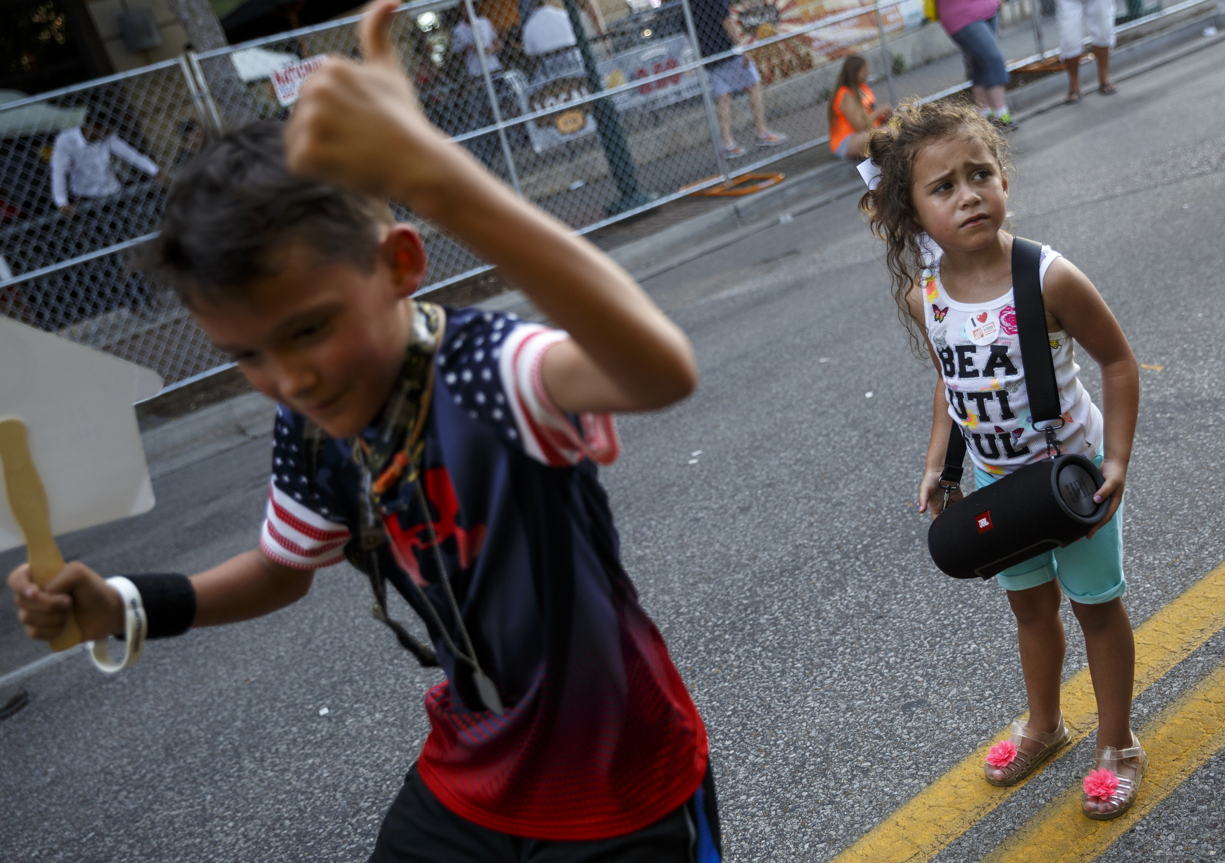 Destiny Riekeberg, right, plays music as Jeter Ramos dances on the 2nd day of the Riverbend Festival at Ross's Landing on Saturday, June 11, 2016, in Chattanooga, Tenn. Rock band Heart headlined Saturday night.