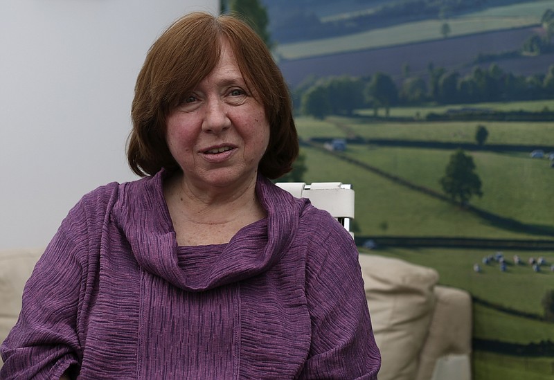 
              FOR STORY RUSSIA NOBEL LAUREATE - In this photo taken Friday, May 27, 2016, Nobel literature laureate Svetlana Alexievich speaks to the Associated Press during an interview in Hay-on-Wye, Wales.  In the view of Alexievich, Russia is taking refuge in ideas from its Soviet past, but this nostalgia collides with newer, darker forces. (Tom Middleton/Hay Festival via AP)
            