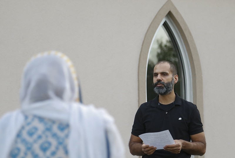 Dr. Mohsin Ali speaks to Chattanooga mourners Sunday during a prayer vigil at the Islamic Society of Greater Chattanooga in response to an Orlando, Fla., mass shooting earlier on Sunday.