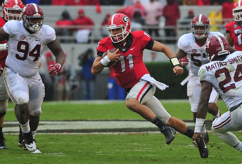 Georgia quarterback Greyson Lambert accounted for just 85 total yards in last October's 38-10 loss to Alabama. The Bulldogs have another rotating cross-divisional challenge this season with a Sept. 24 trip to Ole Miss.