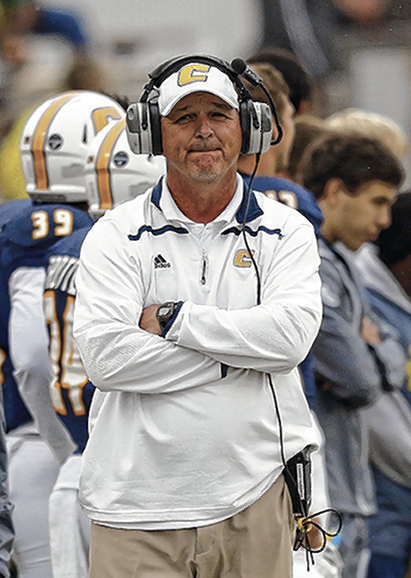 UTC head football coach Russ Huesman stands on the sidelines during the Mocs' SoCon football game against Western Carolina at Finley Stadium on Saturday, Oct. 31, 2015, in Chattanooga, Tenn.