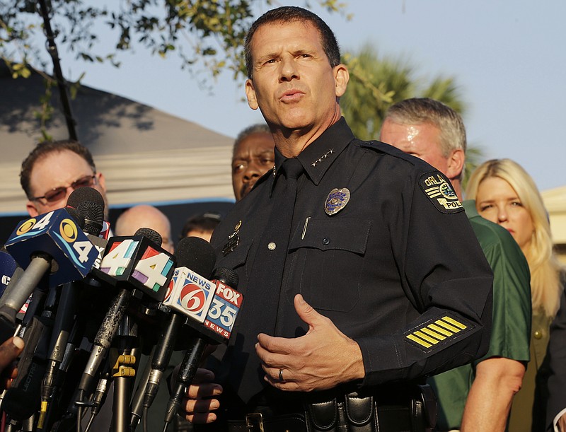 
              Orlando Police Chief John Mina describes the details of the fatal shootings at the Pulse Orlando nightclub during a media briefing Monday, June 13, 2016, in Orlando, Fla. (AP Photo/Chris O'Meara)
            