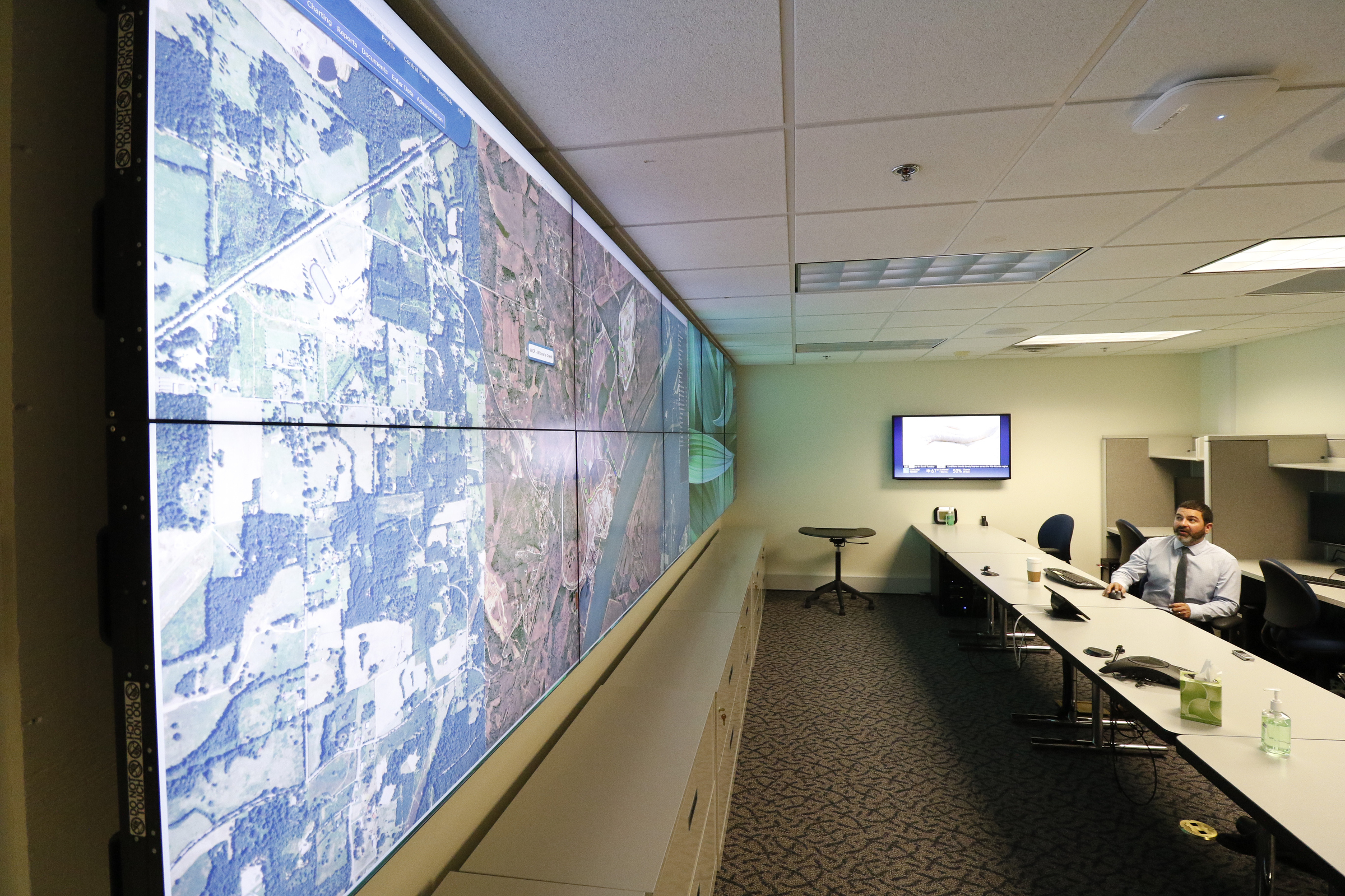 Staff Photo by Dan Henry / The Chattanooga Times Free Press- 9/28/15. Nick McClung, TVA's manager for risk and quality assurance, answers questions during an interview in the ATIM Center where numerous sensors can be monitored to determine the stability of earthen dams that contain coal ash.
