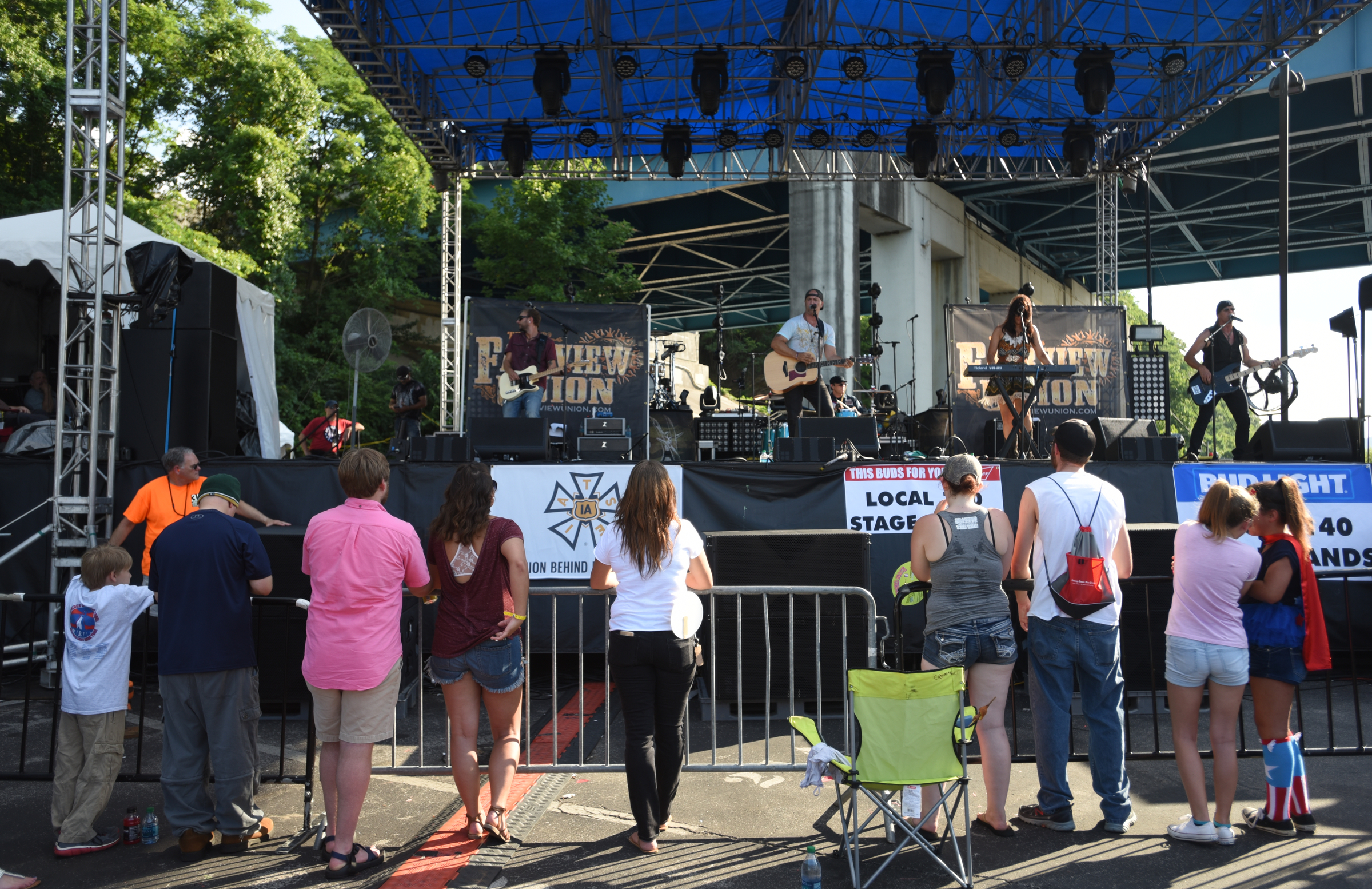 People line up in front of a barricade that was placed this year in front of the Bud Light Stage after huge crowds for Florida Georgia Line and Sam Hunt at previous Riverbend's created a crush at the front of the stage.