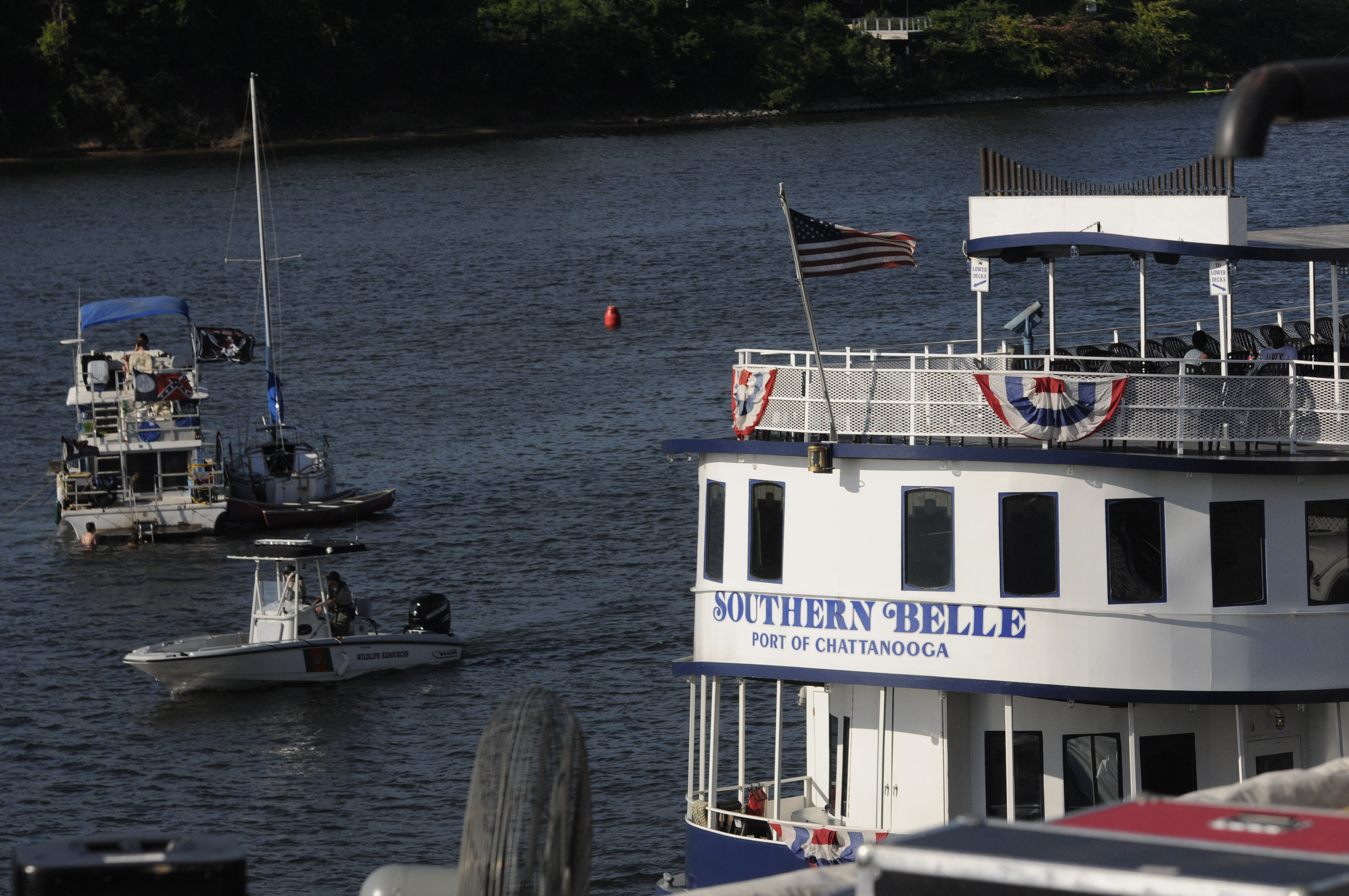 A Tennessee Wildlife Resources Agency boat patrols the waters of the Tennessee River late Thursday at Riverbend.