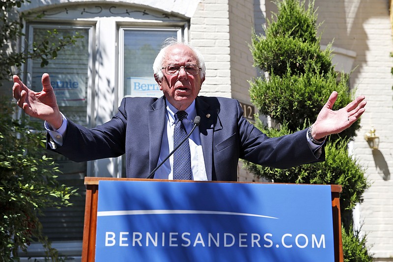
              In this June 14, 2016, photo, Democratic presidential candidate, Sen. Bernie Sanders, I-Vt., speaks during a news conference outside his campaign headquarters in Washington. For Hillary Clinton and Sanders, getting to that Unity, New Hampshire, moment might take some time. (AP Photo/Alex Brandon)
            