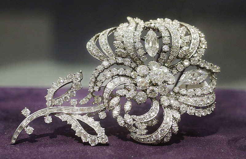 
              A diamond encrusted broach, designed and owned by the late comedian Joan Rivers, is displayed at Christie's, Friday, June 17, 2016, in New York. (AP Photo/Mark Lennihan)
            
