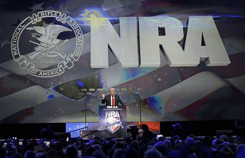 Republican presidential candidate Donald Trump speaks at the National Rifle Association convention, Friday, May 20, 2016, in Louisville, Ky. (AP Photo/Mark Humphrey)