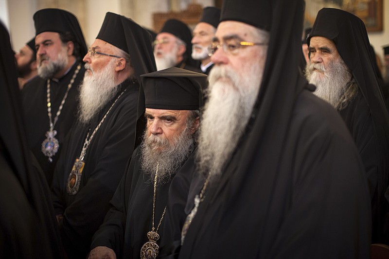 
              In this Saturday, June 18, 2016 photo released by Holy and Great Council, Orthodox Partiarchs taking part in the historic Holy and Great Council celebrate Vespers of Pentecost in Heraklion, on the island of Crete. A historic attempt to bring together all leaders of the world's Orthodox churches for the first time in more than a millennium has stalled after the powerful Russian church and three others pulled out at the last minute over disputes ranging from the seating plan to efforts to reconcile with the Vatican. (Sean Hawkey/Holy and Great Council via AP)
            
