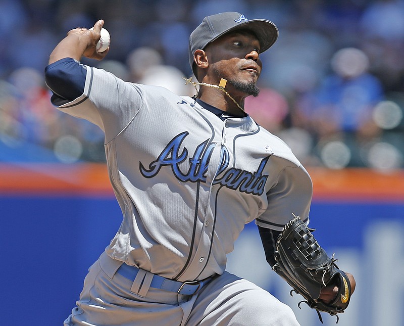 Atlanta Braves starting pitcher Julio Teheran delivers during the second inning of a baseball game against the New York Mets, Sunday, June 19, 2016, in New York. (AP Photo/Kathy Willens)