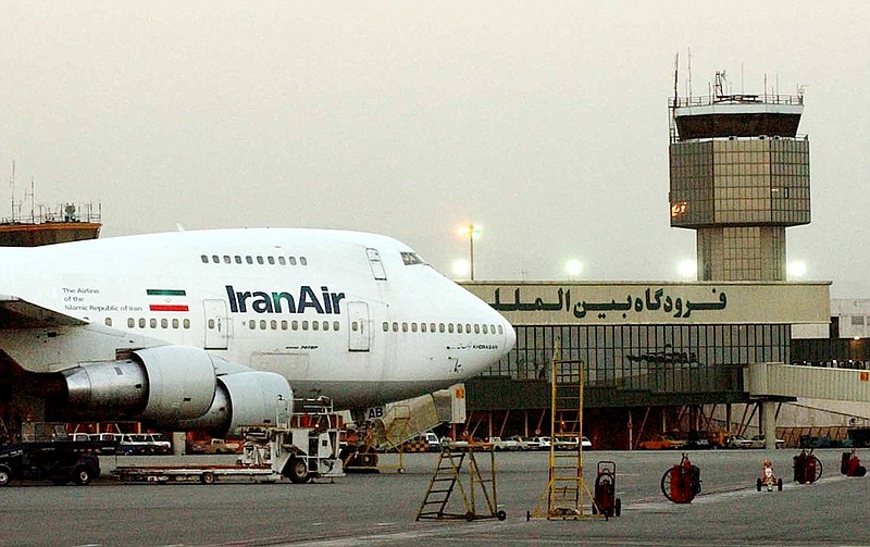 
              FILE - In this June 2003 file photo, a Boeing 747 of Iran's national airline is seen at Mehrabad International Airport in Tehran. Boeing Co. is negotiating a deal to sell 100 airplanes to Iran, state-run media reported Sunday, June 19, 2016 a sale potentially worth billions that would mark the first major entry of an American company into the Islamic Republic after last year's nuclear deal. (AP Photo/Hasan Sarbakhshian, File)
            