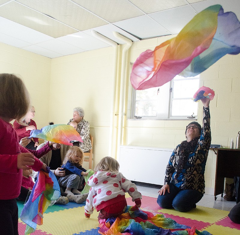 Various tools and toys are employed by Sharla Benedict-Region in her classes to help engage both parents and children in music. For example, she said scarves and fabric are excellent ways for young children to experiment with rhythm.