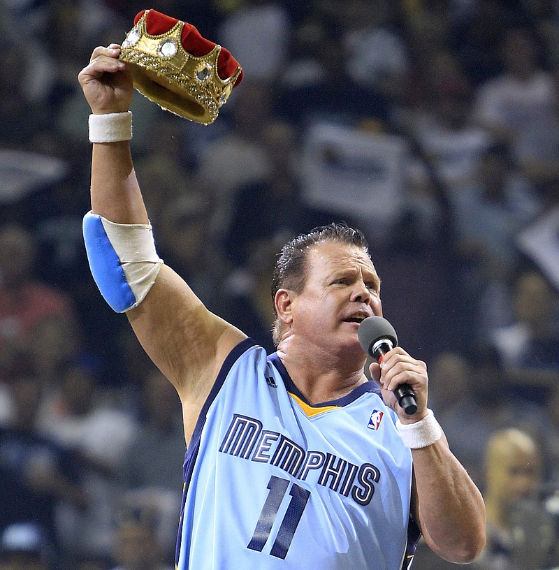 In this April 23, 2011, file photo, professional wrestler Jerry "The King" Lawler gestures to fans before the start of Game 3 of a first-round NBA basketball series between the Memphis Grizzlies and the San Antonio Spurs, in Memphis