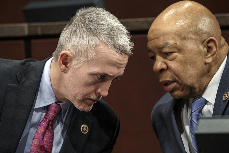 
              FILE - In this Jan. 27, 2015, file photo, House Benghazi Committee Chairman Rep. Trey Gowdy, R-S.C., left, confers with the committee's ranking member Rep. Elijah Cummings, D-Md., during the committee's hearing on Capitol Hill in Washington. The committee has missed a self-imposed deadline to issue a report “before summer," the latest setback for a probe that has gone on for more than two years and drawn scorn from Democrats who say the primary goal of the Republican-led investigation is to undermine Hillary Clinton's presidential bid.(AP Photo/J. Scott Applewhite, File)
            