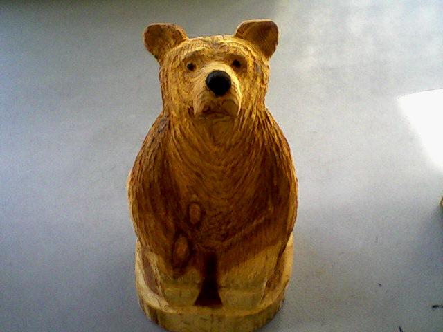 A bear carved from cedar by chainsaw sculptor Steve Pearson.
