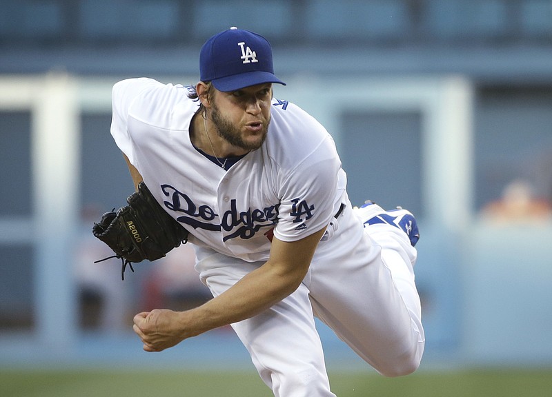 
              Los Angeles Dodgers starting pitcher Clayton Kershaw throws against the Washington Nationals during the first inning of a baseball game, Monday, June 20, 2016, in Los Angeles. (AP Photo/Jae C. Hong)
            