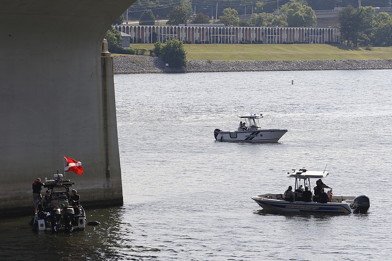 Staff Photo by Dan Henry / The Chattanooga Times Free Press- 6/22/16. Hamilton County Sheriff's Officers prepare to deploy a ROV (remote operated vehicle) while working with other law enforcement agencies to participate in a Joint Port Security Training Exercise on the Tennessee River near Ross's Landing on Wednesday, June 22, 2016. 