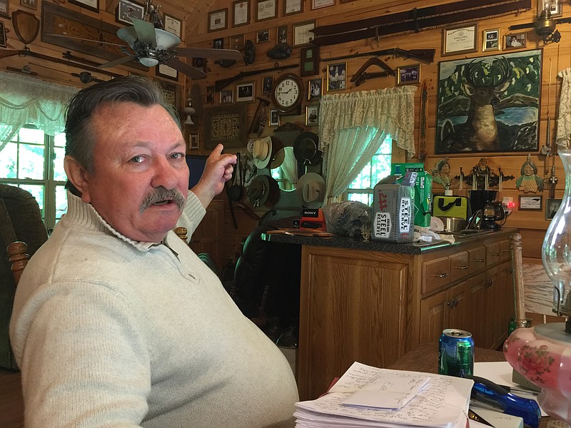 Gary Lawson, 68, shows off his historic artifacts.
