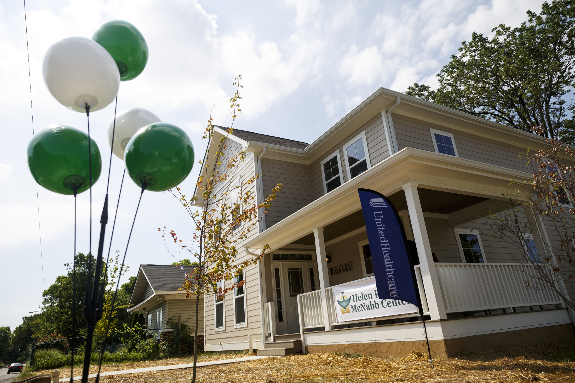 Balloons are placed outside of Bailey Home, a new residence facility for people with mental disabilities, for a ribbon-cutting on Tuesday, June 21, 2016, in Chattanooga, Tenn. The co-ed facility set up by Helen Ross McNabb Center will house 10 residents.