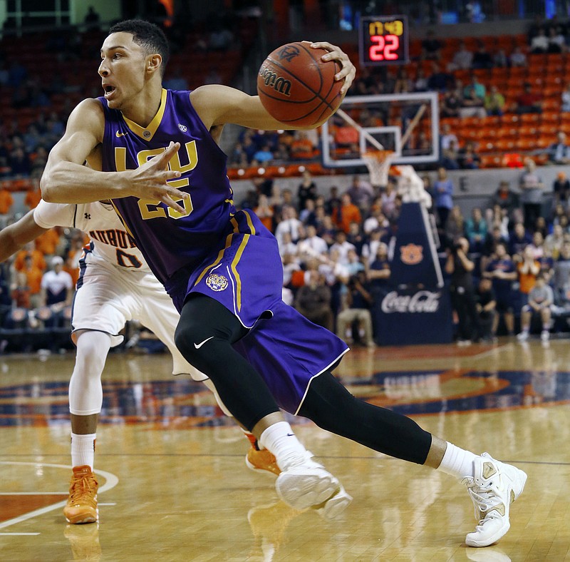 
              FILE - In this Feb. 2, 2016 file photo, LSU's Ben Simmons drives to the basket against Auburn during the first half of an NCAA college basketball game in Auburn, Ala. Ben Simmons and Brandon Ingram look to be the first two picks in the NBA draft, leaving most of the drama Thursday night around who be the No. 3 pick. (Todd J. Van Emst/Opelika-Auburn News via AP, File) MANDATORY CREDIT
            