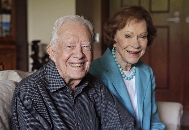 
              Jimmy and Rosalynn Carter talk about their years together in his office on Wednesday, June 22, 2016, at the Carter Center in Atlanta. They will celebrate their 70th wedding anniversary on July 7.  Jimmy and Rosalynn Carter say his recent treatment for cancer has brought them even closer together.  (Bob Andres/Atlanta Journal-Constitution via AP)  MARIETTA DAILY OUT; GWINNETT DAILY POST OUT; LOCAL TELEVISION OUT; WXIA-TV OUT; WGCL-TV OUT; MANDATORY CREDIT
            