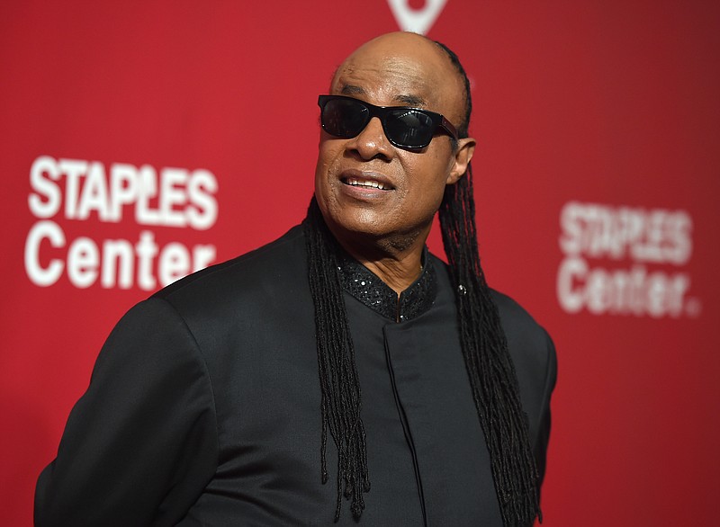 
              FILE - In this Feb. 13, 2016 file photo, Stevie Wonder arrives at the MusiCares Person of the Year tribute honoring Lionel Richie in Los Angeles. BET announced Thursday, June 23, that Wonder will join Sheila E., D’Angelo, The Roots and Janelle Monae to honor Prince at the Microsoft Theater in Los Angeles. (Photo by Jordan Strauss/Invision/AP, File)
            