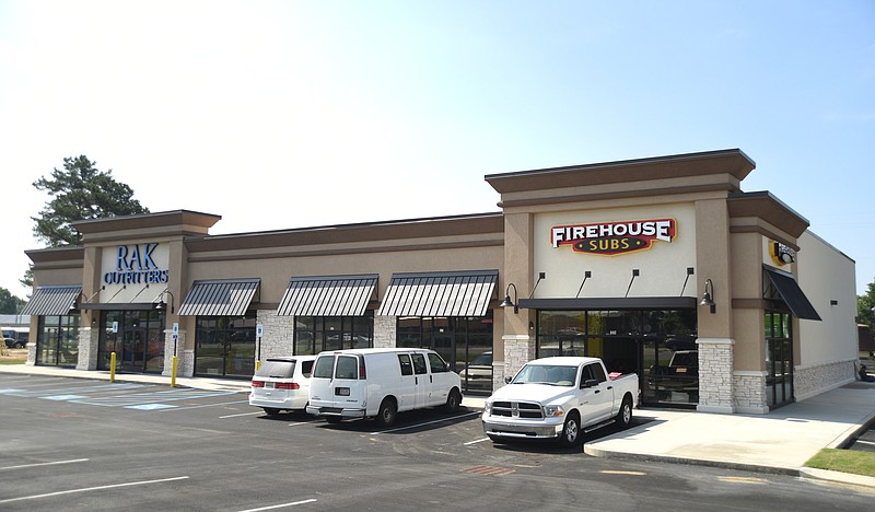 A new strip mall on Battlefield Parkway features a Firehouse Subs and RAK Outfitters.