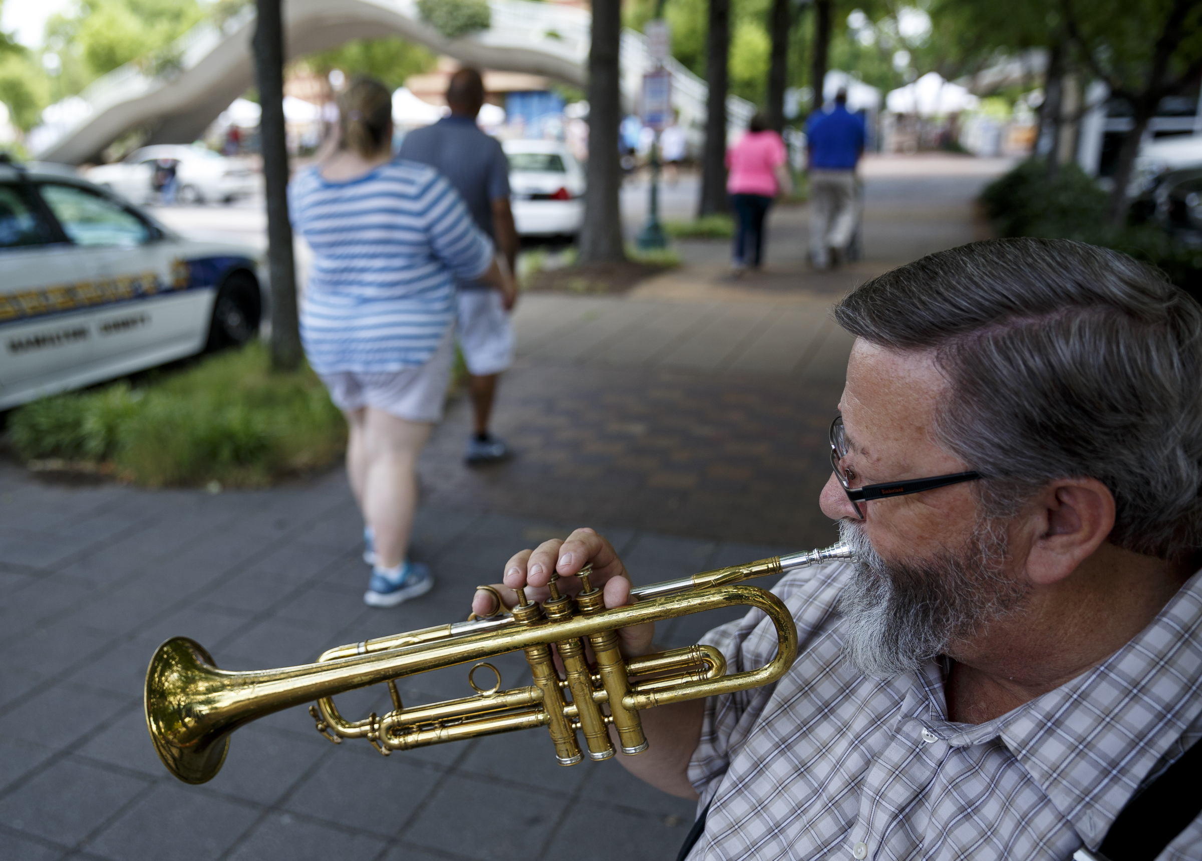 Trumpeter Randy Croy is one of about 50 musicians who have signed up for Sidewalk Stages, a way to get local musicians out in front of people and highlights Chattanooga's musical offerings. Musicians get paid $25 and get to keep any tips from passers-by.