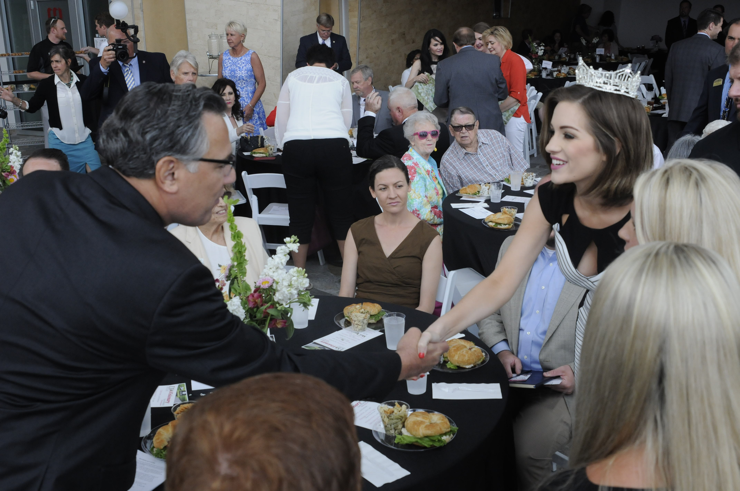 Greg Vital, left, greets Miss America Betty Cantrell at the D9 Visionary Lunch.