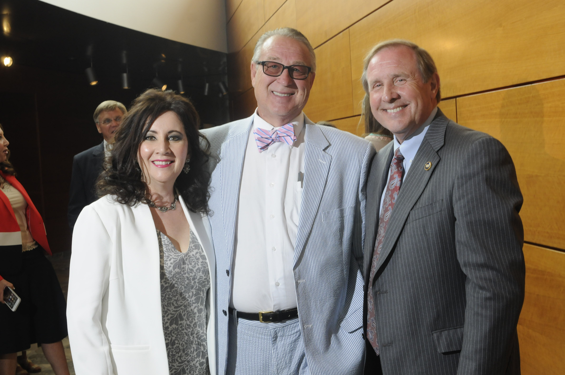 Michelle Harstine, left, Dean Moorehouse and state Rep. Mike Carter, from left.