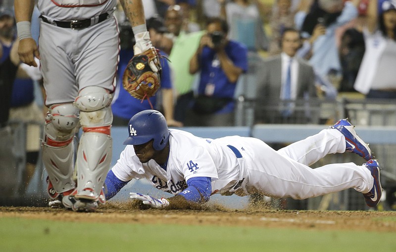 Dodgers still undecided about calling up Yasiel Puig from minor