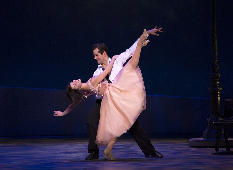 
              This image released by Boneau/Bryan-Brown shows Leanne Cope and Robert Fairchild during a performance of "An American in Paris." Producers announced the show will close on Jan. 1, 2017, after playing some 750 performances. (Angela Sterling/Boneau/Bryan-Brown via AP)
            