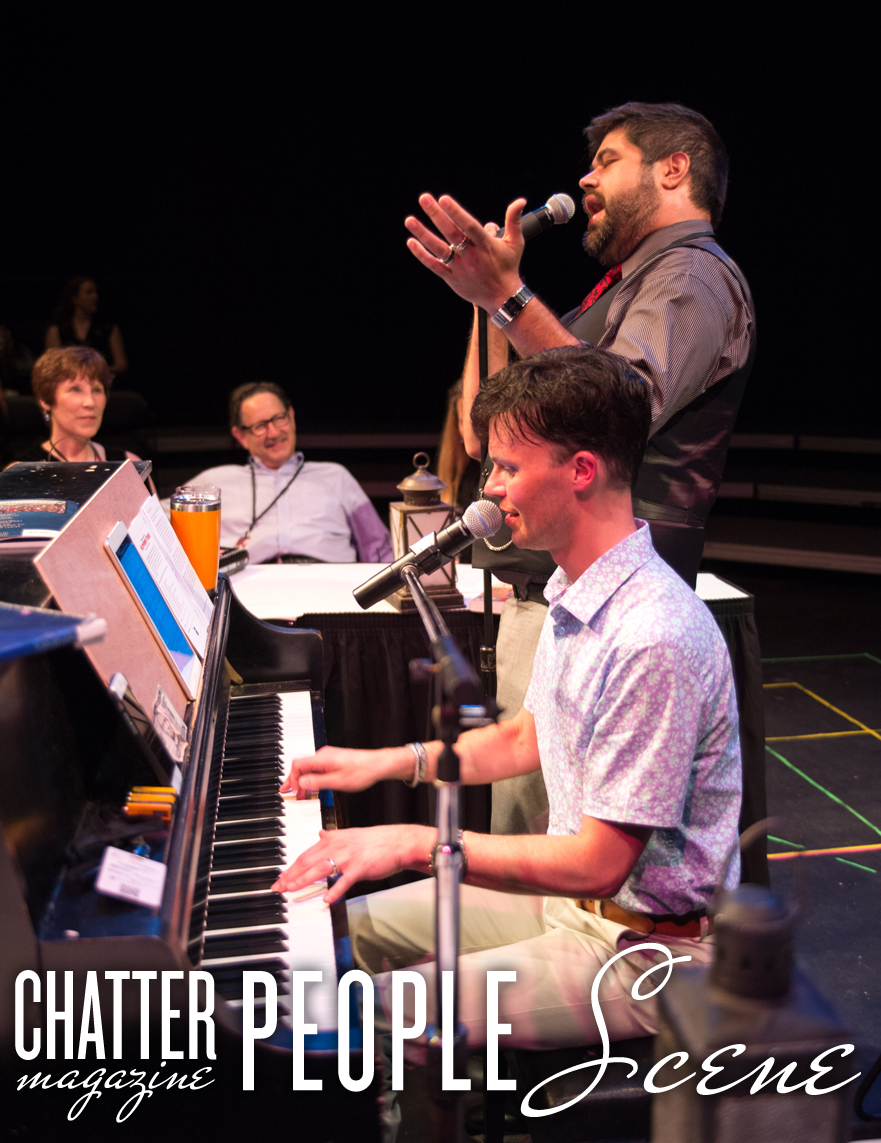 Andrew Chauncey and Bryan Kelly perform a song.