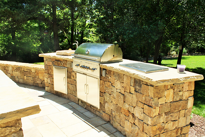 An outdoor kitchen by Southern Luxury