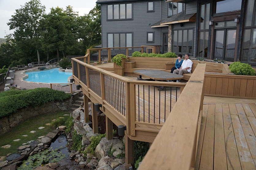 The Hermans' outdoor living space includes a deck, a pool, a rock garden and much more.