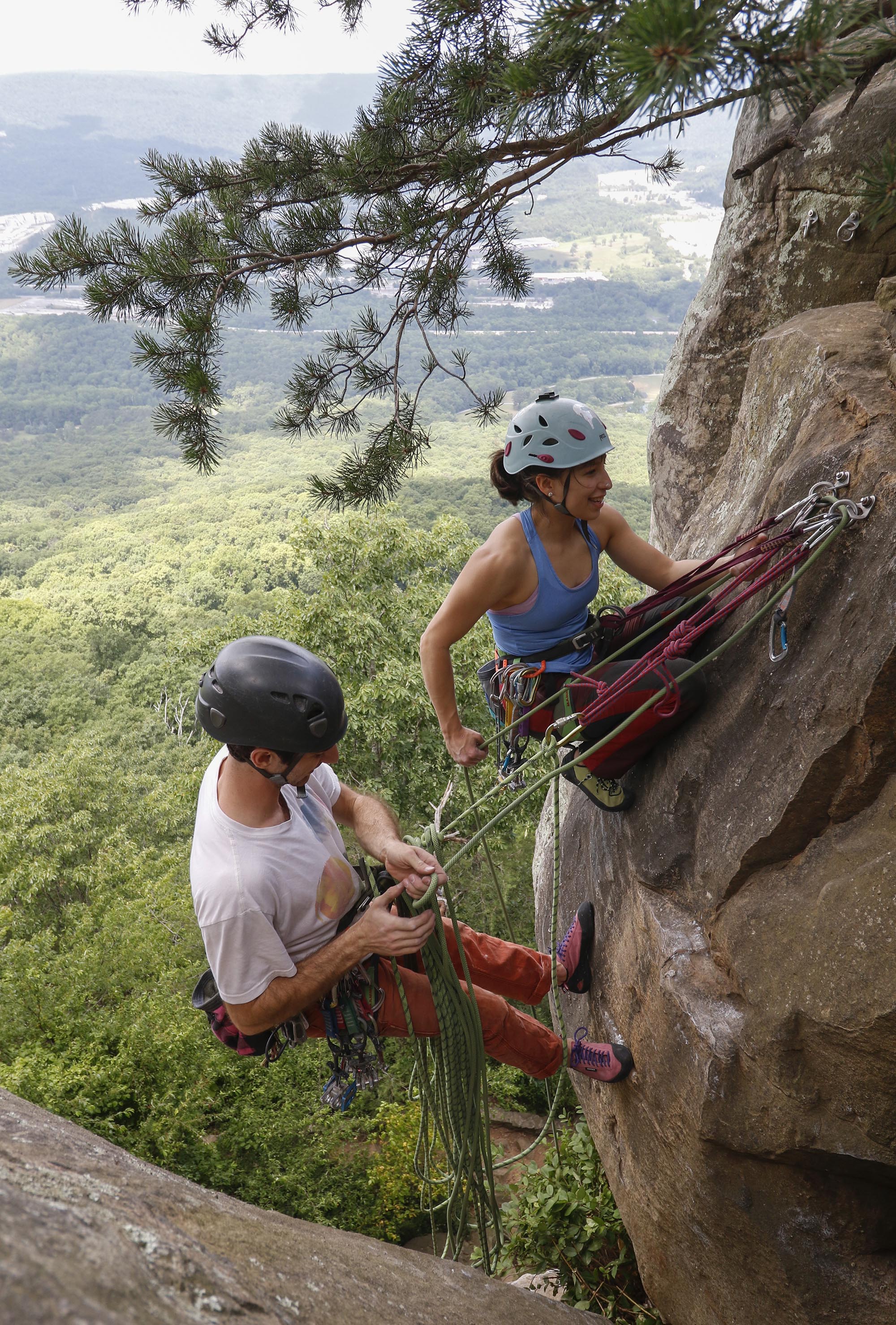 Staff Photo by Dan Henry / The Chattanooga Times Free Press- 6/23/16. Sam Latone and Ana Jimenez simulate a multi pitch climb at Sunset Rock atop Lookout Mountain on June 23, 2016 in preparation for an upcoming trip to Colorado.