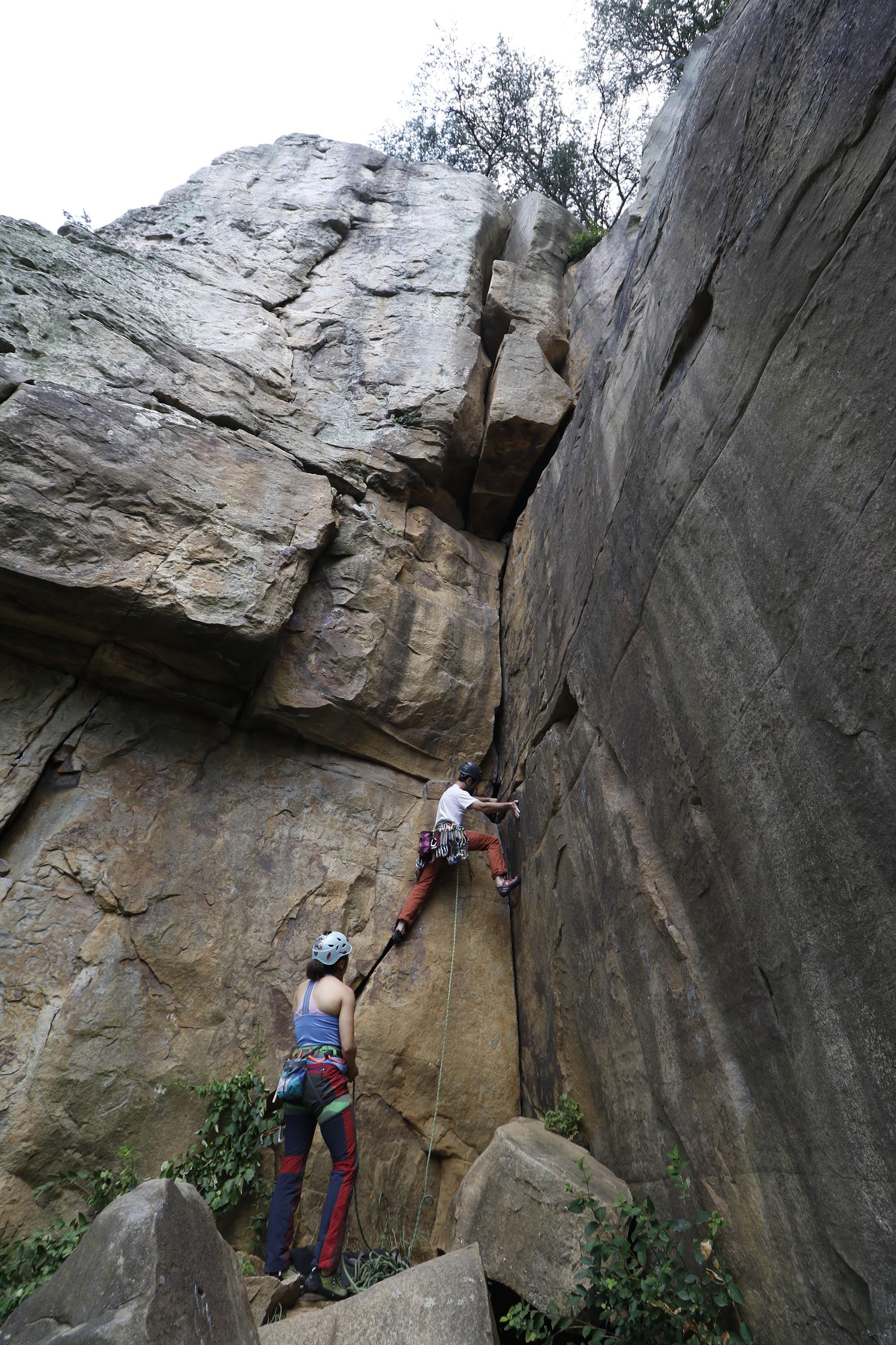Staff Photo by Dan Henry / The Chattanooga Times Free Press- 6/23/16. Sam Latone and Ana Jimenez simulate a multi pitch climb at Sunset Rock atop Lookout Mountain on June 23, 2016 in preparation for an upcoming trip to Colorado.