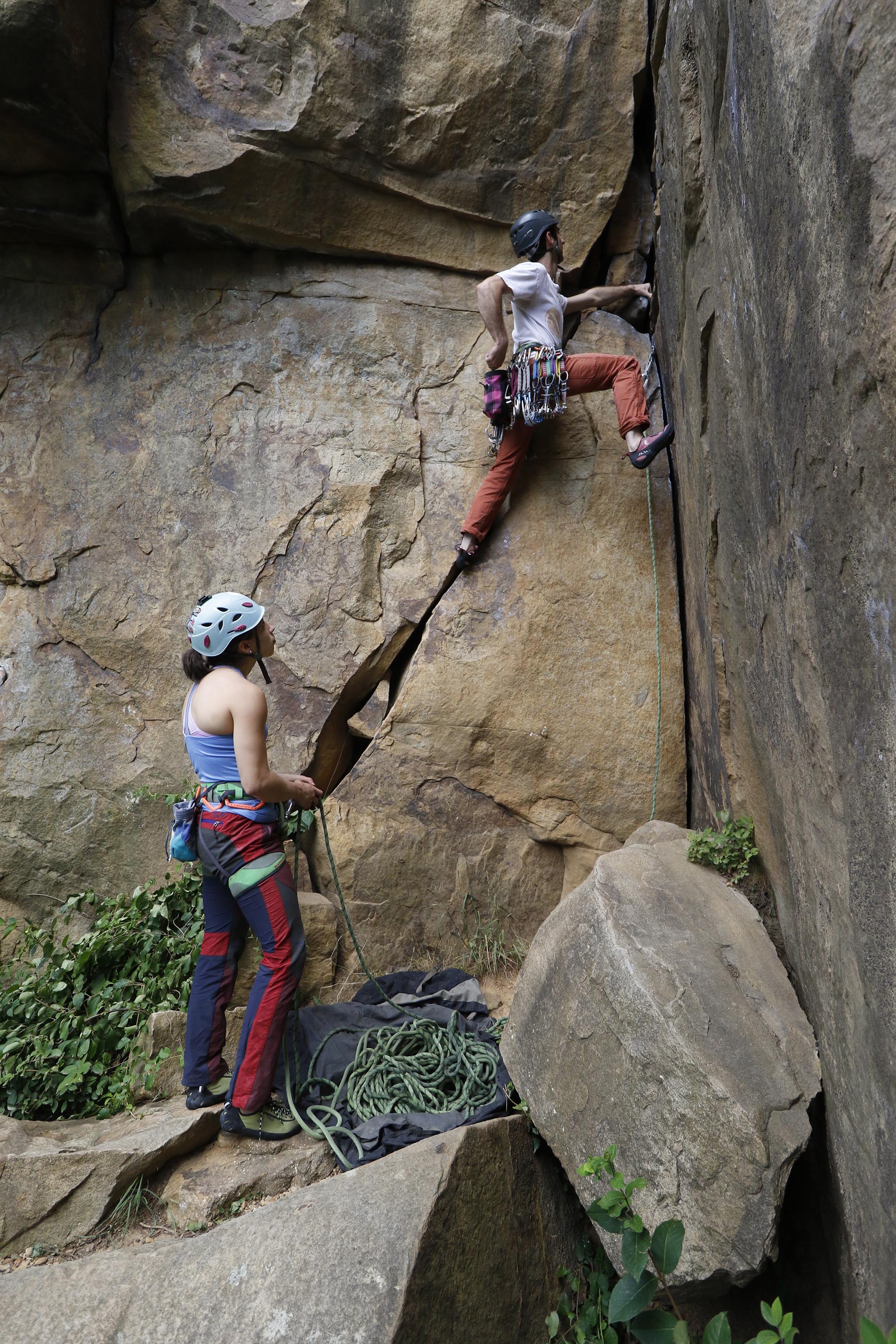 Staff Photo by Dan Henry / The Chattanooga Times Free Press- 6/23/16. Sam Latone and Ana Jimenez simulate a multi pitch climb at Sunset Rock atop Lookout Mountain on June 23, 2016 in preparation for an upcoming trip to Colorado.