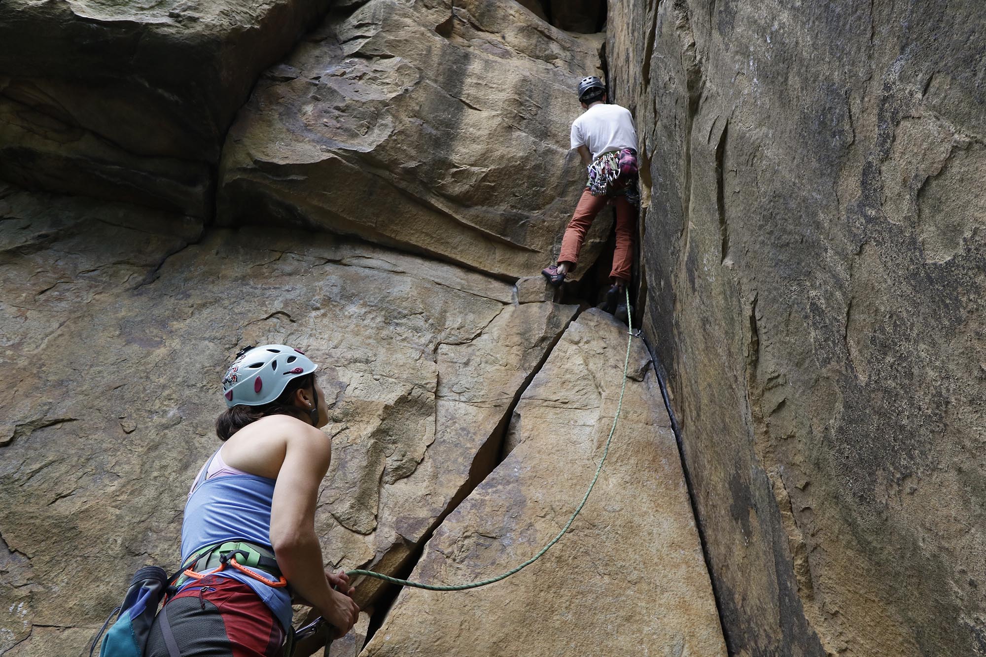 Staff Photo by Dan Henry / The Chattanooga Times Free Press- 6/23/16. Sam Latone and Ana Jimenez simulate a multi pitch climb at Sunset Rock atop Lookout Mountain on June 23, 2016 in preparation for an upcoming trip to Colorado.